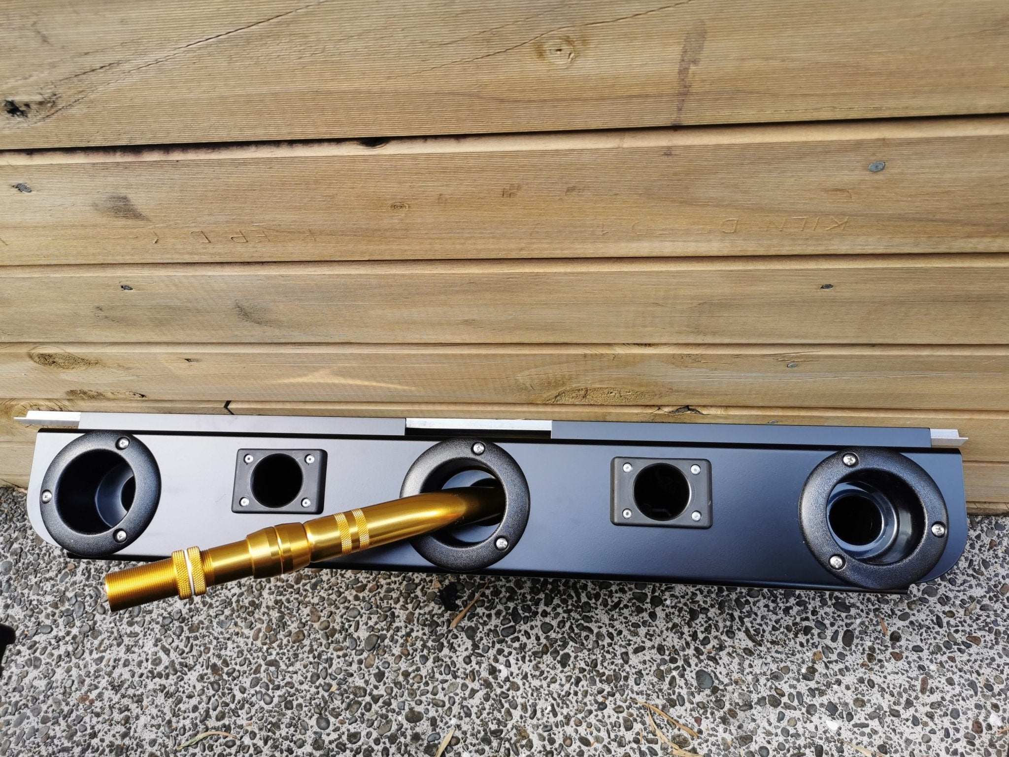 Game Bent Butt hold 3 game rods horizontally - Ultimate Rod Racks NZ allowing to walk past in a stabicraft wall mounted