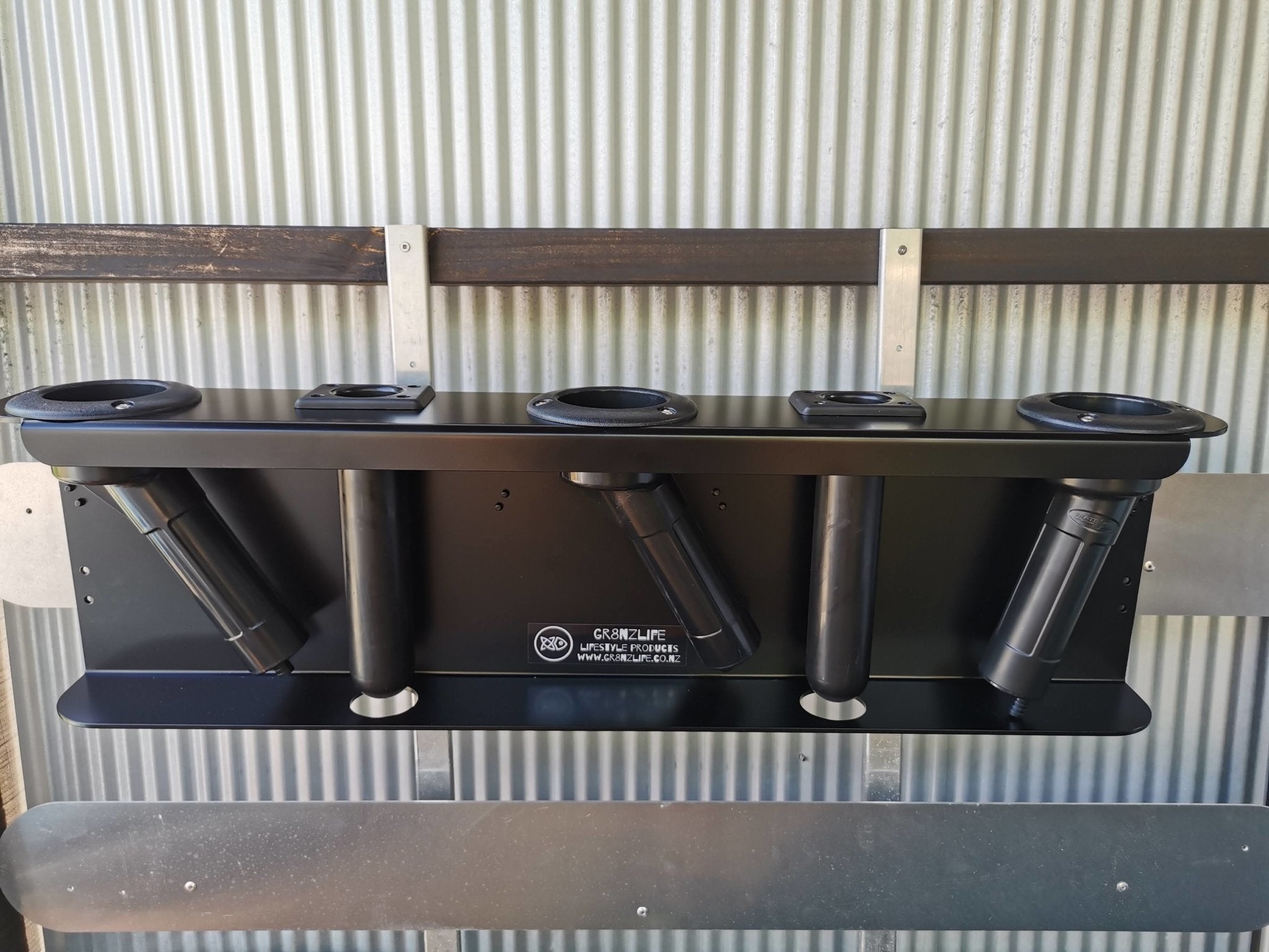 Game Bent Butts 3 game rods horizontally - Ultimate Rod Racks NZ allowing to walk past in a wall mount